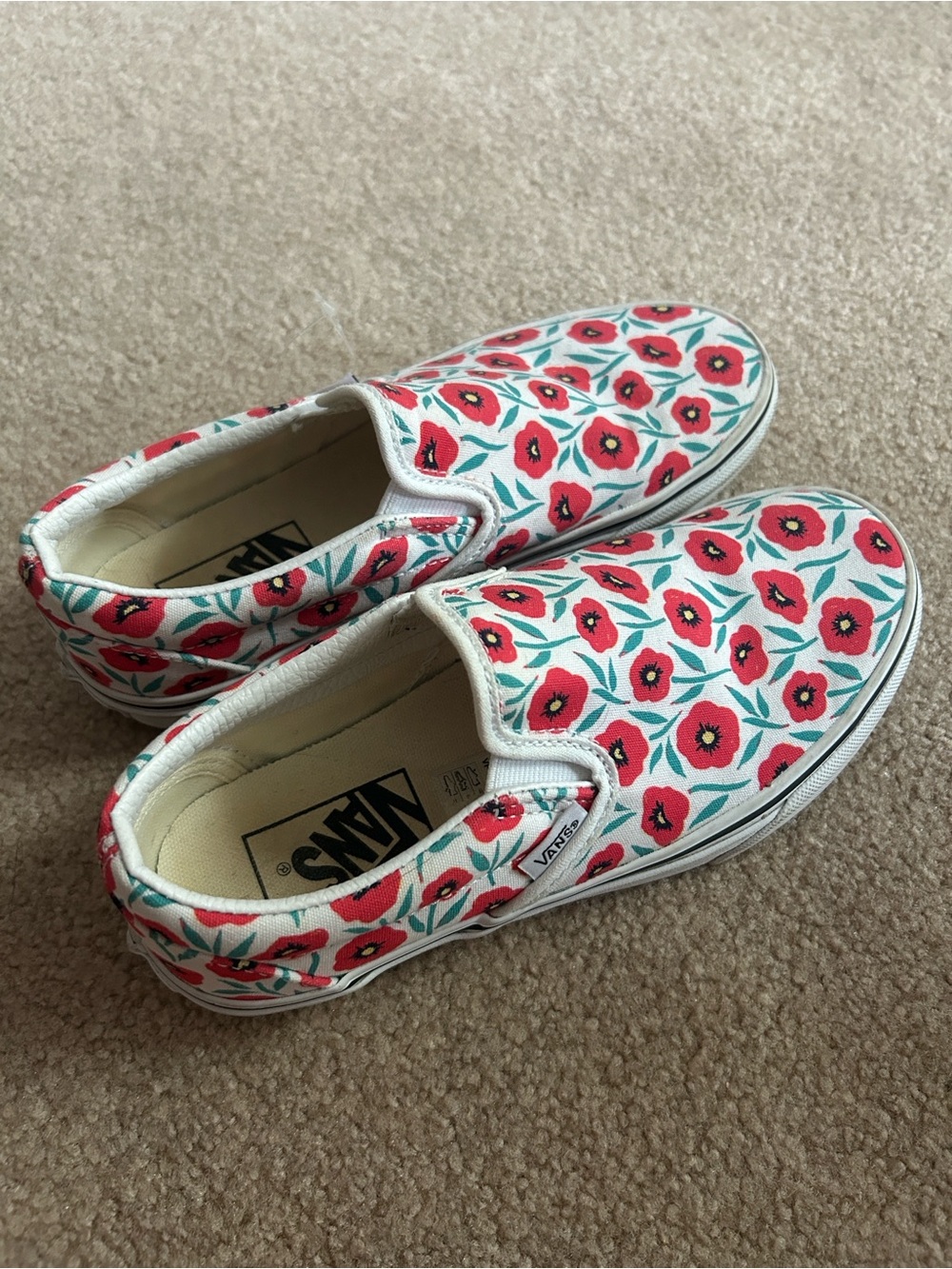 Vans Kids Classic Slip-On Canvas Sneakers in White with Red Floral Poppy print.